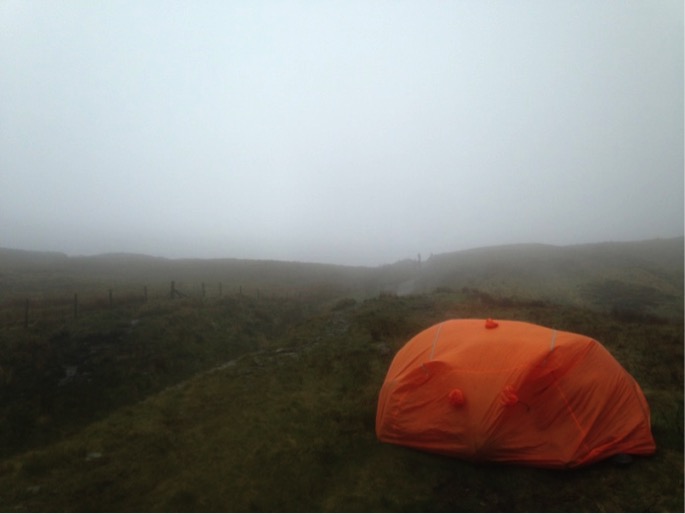 Group Shelter set up on foggy hill