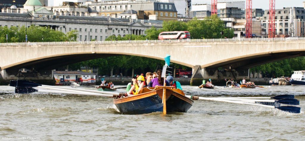 Oarsome crew passing under bridge